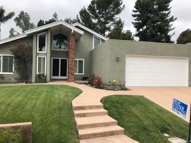 Outside of a green residential home in San Diego County.